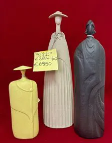 Tris statuette in gres dimensioni 23cm - 38cm - 41cm